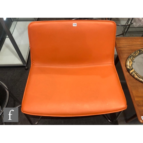 1172 - Unknown - A single orange leather and tubular chrome chair, the wide seat, on splayed chrome support... 