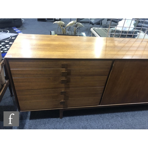 918 - Ib Kofod-Larsen - G-Plan - A teak sideboard, fitted with an arrangement of five graduated drawers to... 