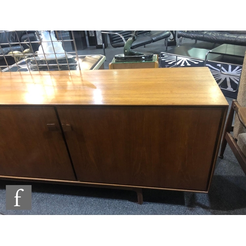 918 - Ib Kofod-Larsen - G-Plan - A teak sideboard, fitted with an arrangement of five graduated drawers to... 