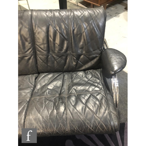 976 - Mark Lawson - Pieff Furniture - A three seat black leather upholstered sofa with chromium plated tub... 