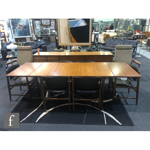 919 - Ib Kofod-Larsen - G-Plan - A model number 4399 teak extending dining table of rectangular form, with... 