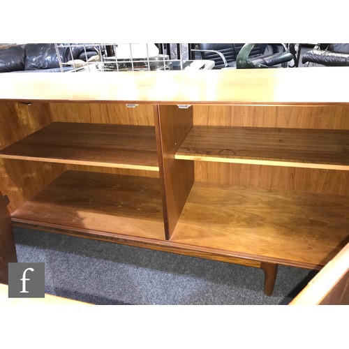 918 - Ib Kofod-Larsen - G-Plan - A teak sideboard, fitted with an arrangement of five graduated drawers to... 