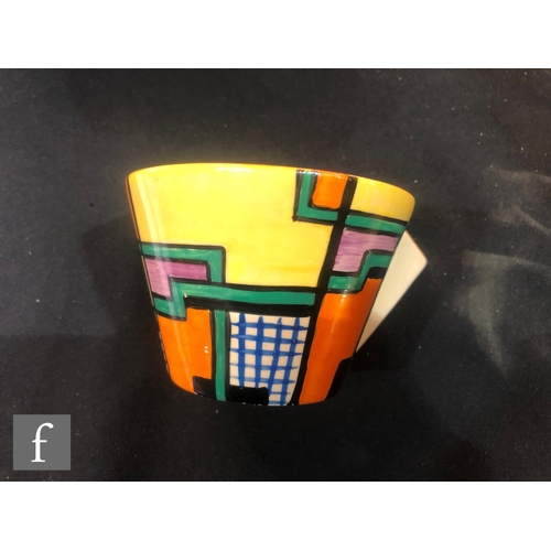 201 - Clarice Cliff - Football - A Conical shape tea cup and saucer circa 1930 hand painted with a block, ... 