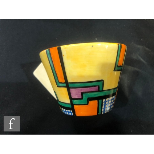 201 - Clarice Cliff - Football - A Conical shape tea cup and saucer circa 1930 hand painted with a block, ... 