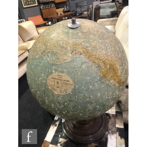 942 - George Philip & Son Ltd - A mid 20th Century 19 inch terrestrial globe, raised to a turned woode... 