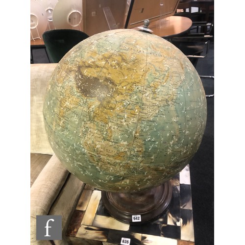 942 - George Philip & Son Ltd - A mid 20th Century 19 inch terrestrial globe, raised to a turned woode... 