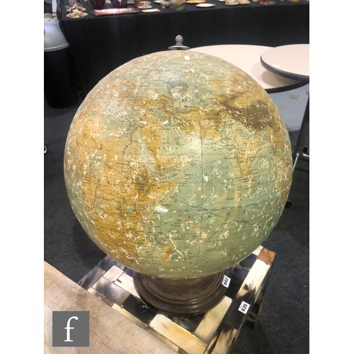 942 - George Philip & Son Ltd - A mid 20th Century 19 inch terrestrial globe, raised to a turned woode... 