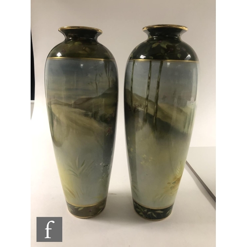 93 - A mirrored pair of early 20th Century Royal Bonn Art Nouveau vases decorated by J. Sticher with a ha... 