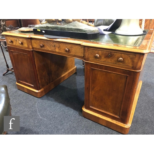 1236 - A Victorian figured walnut inverted breakfront partners desk by Edwards and Roberts, fitted with thr... 