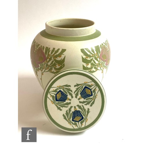 25 - A vase and cover in the Art Nouveau style decorated with stylised flowers and foliage to the bulbous... 