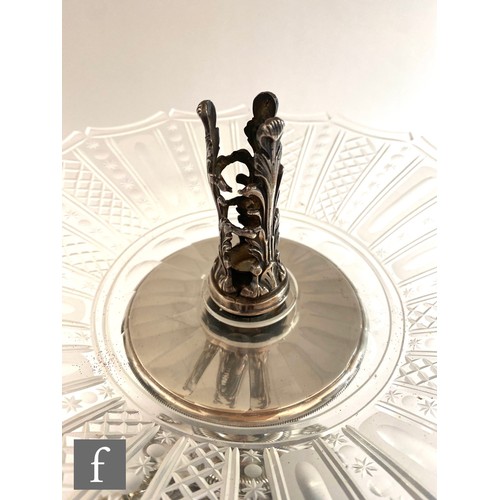 410 - A late 19th Century silver plated table centrepiece, tri form silver plated base decorated with thre... 