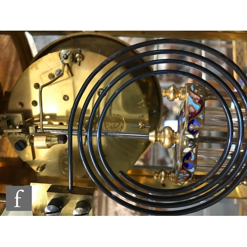 903 - A 19th Century French champleve enamelled brass clock garniture, the eight day movement striking on ... 