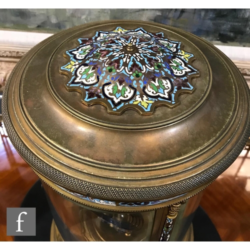 903 - A 19th Century French champleve enamelled brass clock garniture, the eight day movement striking on ... 