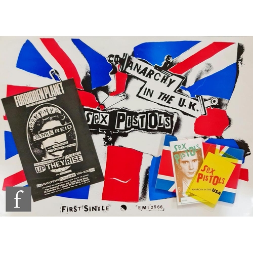 64 - A collection of Sex Pistols memorabilia, to include a 1997 promotional Jamie Reid postcard set, incl... 