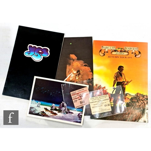 72 - A collection of 1970s music memorabilia, to include an original 1970s Santana and Earth, Wind & ... 