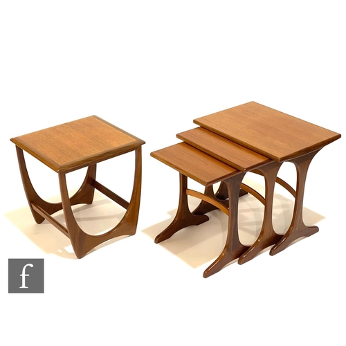 1242 - A nest of three early 1970s G-Plan teak occasional tables designed by Victor B. Wilkins, bearing red... 