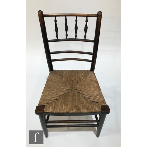 1236 - A late 19th Century ash framed Sussex type chair with woven grass seat and turned frame, together wi... 