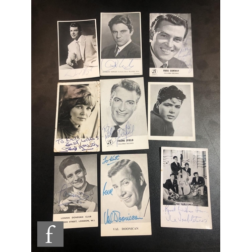 86 - A collection of autographed photographs and postcards, artists to include Max Bygraves, Freddie and ... 