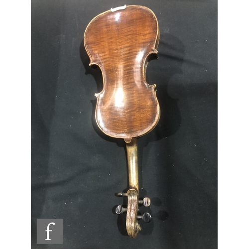 943 - A late 19th to early 20th Century violin with spruce sound board and one piece maple back, bearing s... 