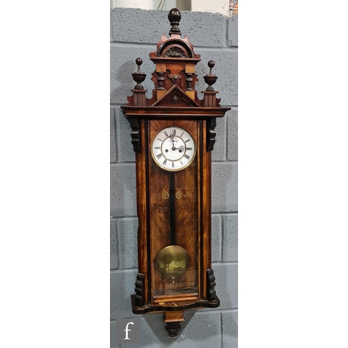 946 - A 19th Century walnut and part ebonised cased regulator wall clock, the weight driven movement enclo... 