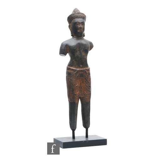 205 - A Burmese figure of a Nat, the patinated bronze figure modelled in standing position, wearing offici... 