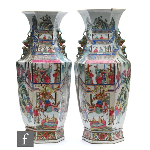 228 - A pair of Chinese 19th Century Canton famille rose vases, each of hexagonal form, rising from a high... 