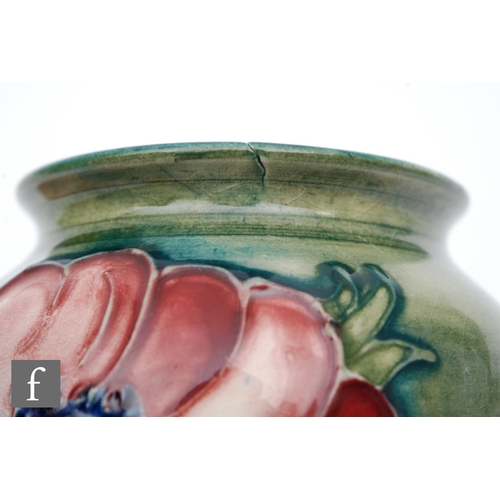 145 - A small Moorcroft Pottery vase decorated in the Anemone pattern, impressed mark, height 7.5cm.