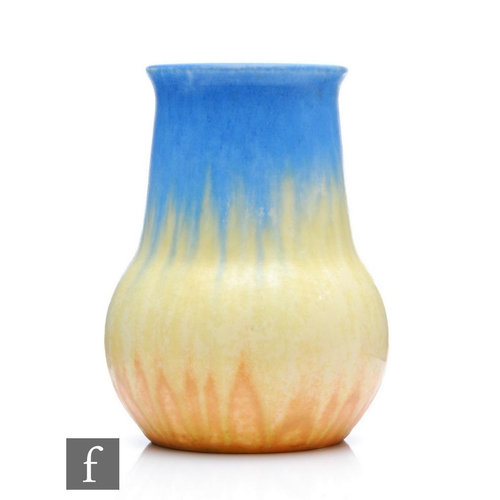 2 - A Ruskin Pottery crystalline glaze vase of globe and shaft form decorated in a blue to yellow to ora... 