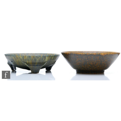 4 - Two Ruskin Pottery bowls, the first decorated in a mottled brown blue glaze, impressed mark and date... 