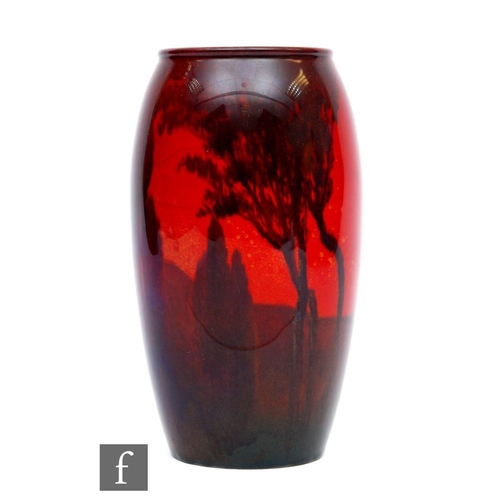 5 - A Royal Doulton Flambe vase decorated in the round with a tree lined silhouette, printed mark alongs... 