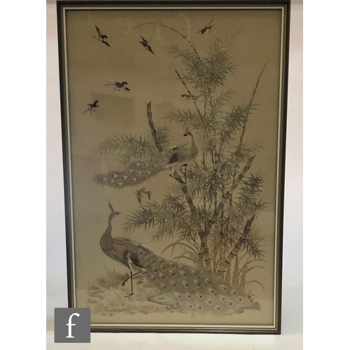 235 - A Chinese embroidered framed panel in the Hundred Bird style, the pale ivory coloured fabric embroid... 