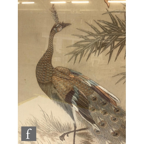 235 - A Chinese embroidered framed panel in the Hundred Bird style, the pale ivory coloured fabric embroid... 