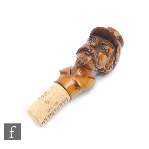 949 - A late 19th Century carved walnut walking stick handle in the form of an American Confederate soldie... 