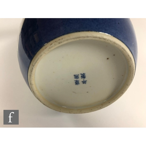 195 - A Chinese Powder Blue porcelain vase of rounded ovoid form, the exterior sides picked out with fan s... 