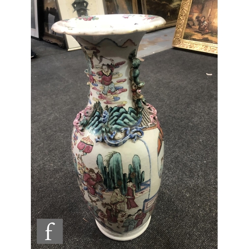 227 - A Chinese 19th Century Canton famille rose vase of baluster form, the neck extending to a flared and... 