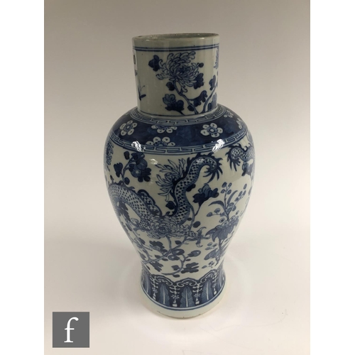 200 - A Chinese blue and white porcelain vase, late Qing Dynasty (1644-1912), of baluster form extending t... 