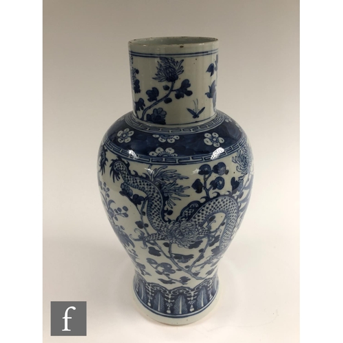 200 - A Chinese blue and white porcelain vase, late Qing Dynasty (1644-1912), of baluster form extending t... 