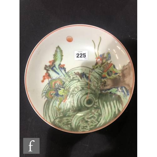 225 - A set of eight Chinese famille verte dishes, each of circular form, the shallow well of each decorat... 