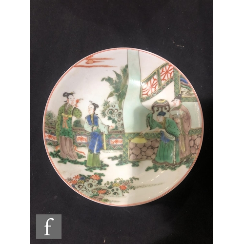 225 - A set of eight Chinese famille verte dishes, each of circular form, the shallow well of each decorat... 