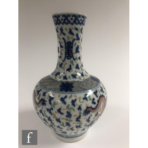 208 - A Chinese Wucai style vase, the porcelain bottle vase with underglazed blue and overglazed red ename... 