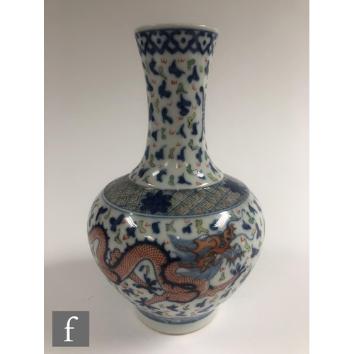 208 - A Chinese Wucai style vase, the porcelain bottle vase with underglazed blue and overglazed red ename... 