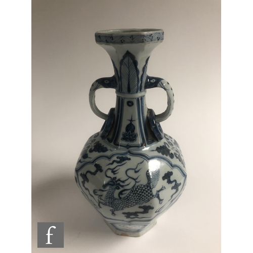 210 - Two Chinese blue and white porcelain vases, each of bottle form decorated with Qilin and dragon, bef... 