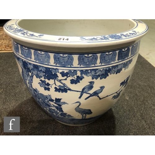 214 - A Chinese blue and white porcelain fish bowl, the large vessel decorated to the exterior with a cont... 