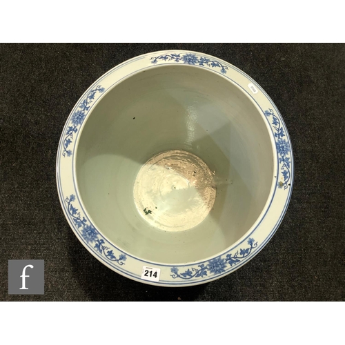 214 - A Chinese blue and white porcelain fish bowl, the large vessel decorated to the exterior with a cont... 