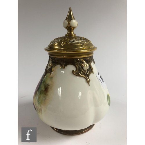 88 - A Royal Worcester Fallen Fruits shape H291 vase with spire cover panel decorated by Owen with hand p... 