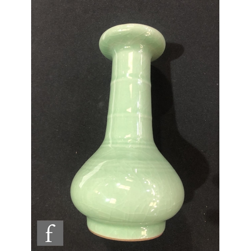 197 - A collection of Chinese porcelain items, to include a green glazed vase with six-character Qianlong ... 