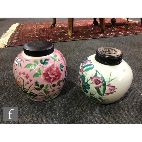 224 - Two Chinese famille rose vases, each of ovoid form, the first with a pink ground detailed with flowe... 