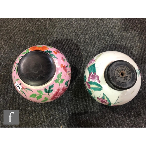 224 - Two Chinese famille rose vases, each of ovoid form, the first with a pink ground detailed with flowe... 