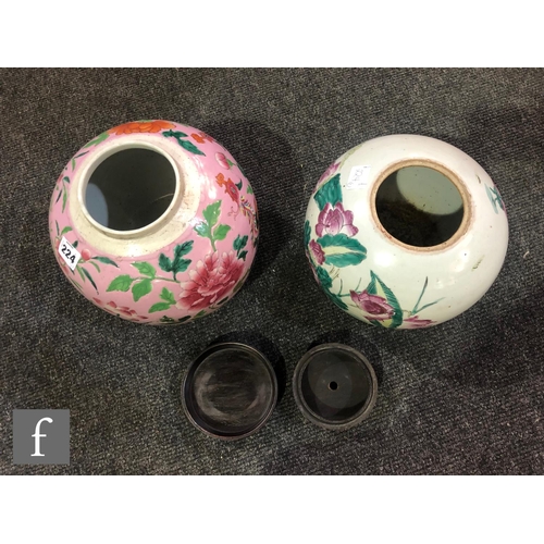 224 - Two Chinese famille rose vases, each of ovoid form, the first with a pink ground detailed with flowe... 