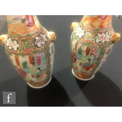 211 - A collection of Chinese 19th/20th Century famille rose vases, to include a pair of ovoid form with g... 